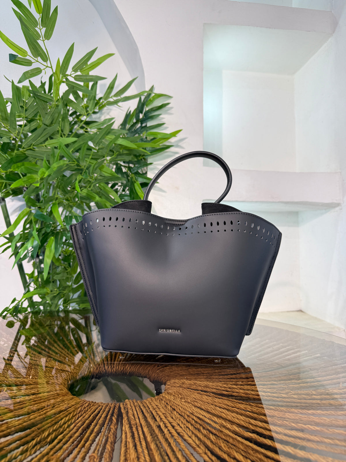 CHRISBELLA LASER-CUT BUCKET BAG
