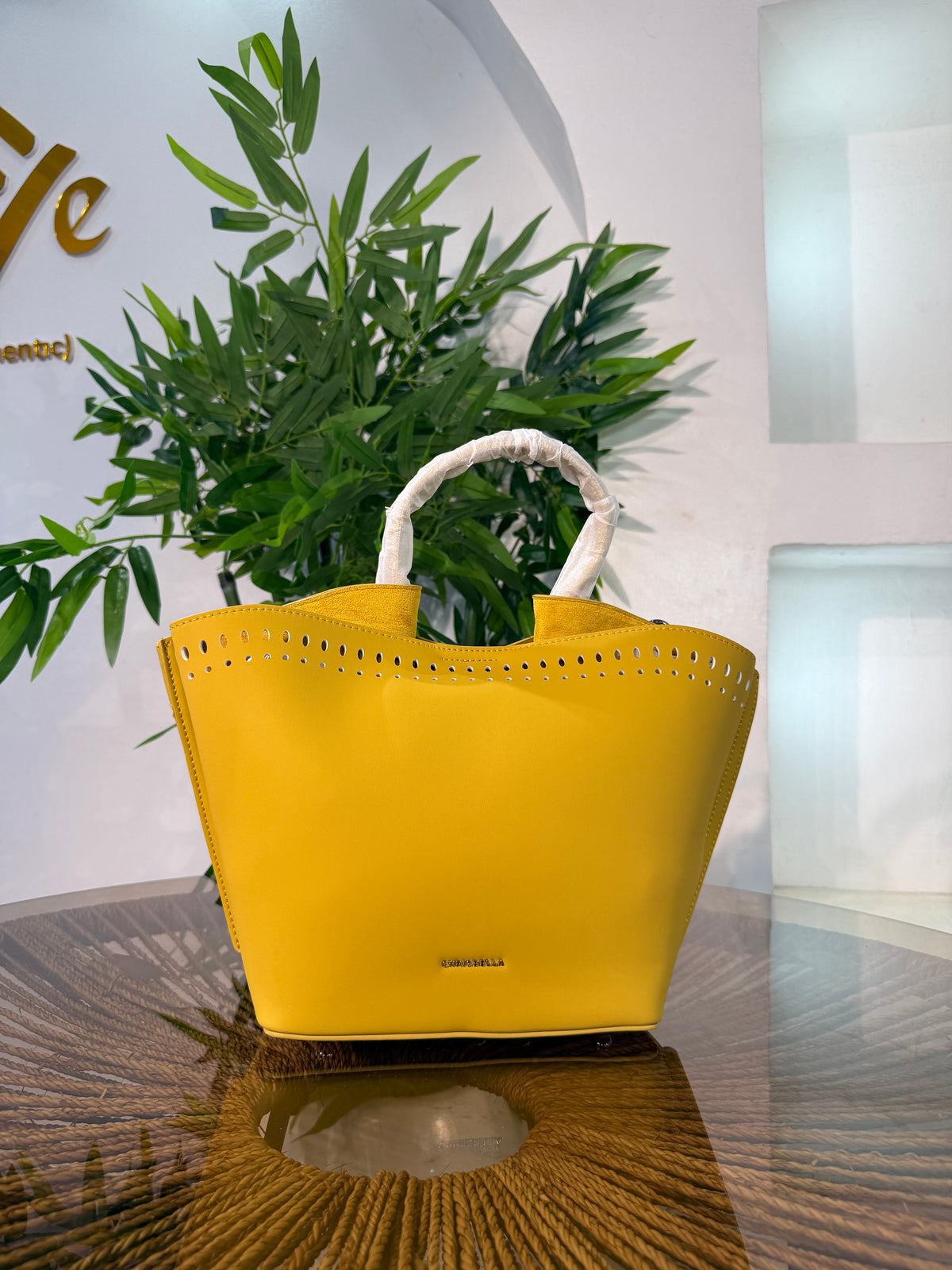 CHRISBELLA LASER-CUT BUCKET BAG