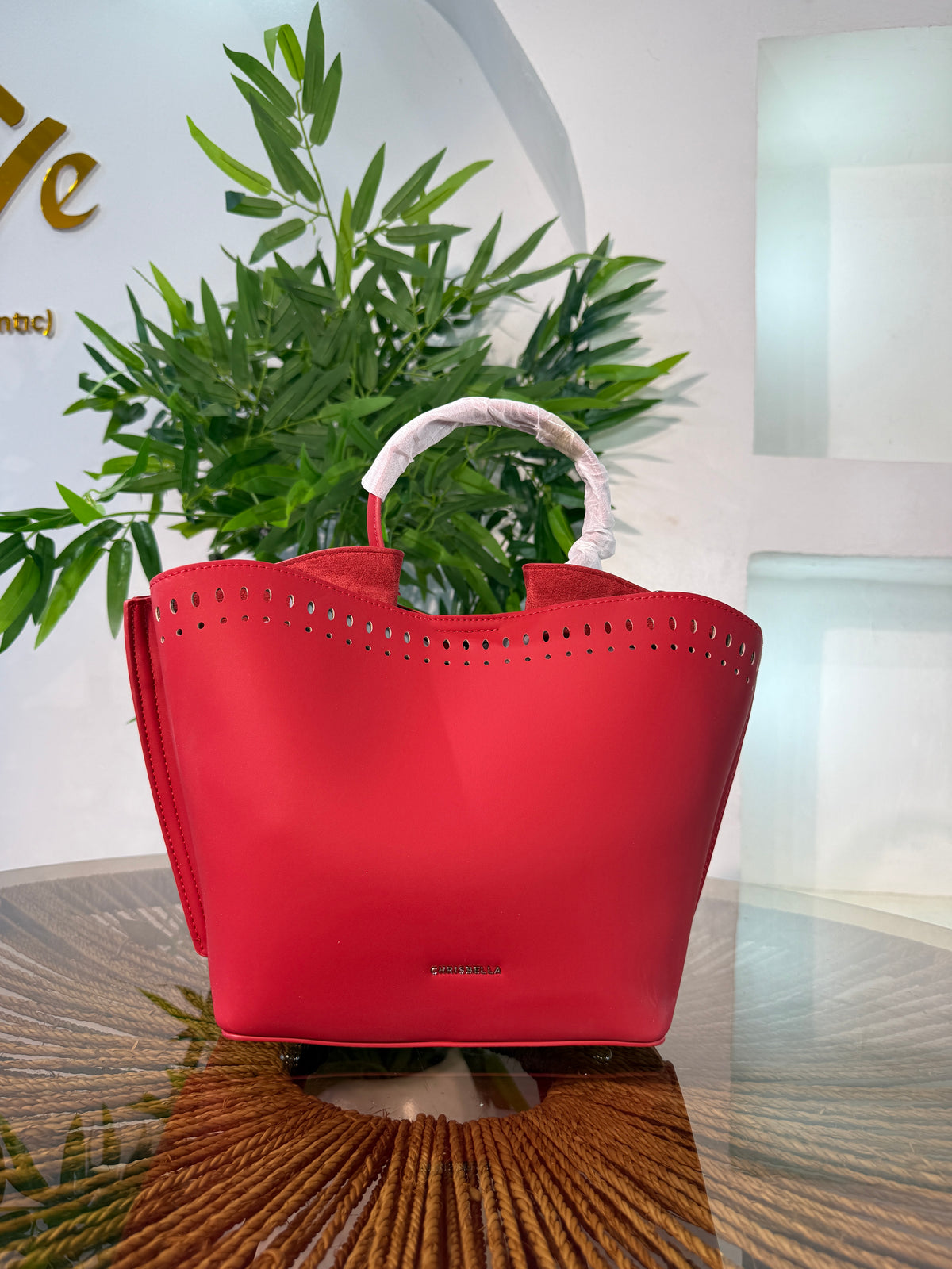 CHRISBELLA LASER-CUT BUCKET BAG